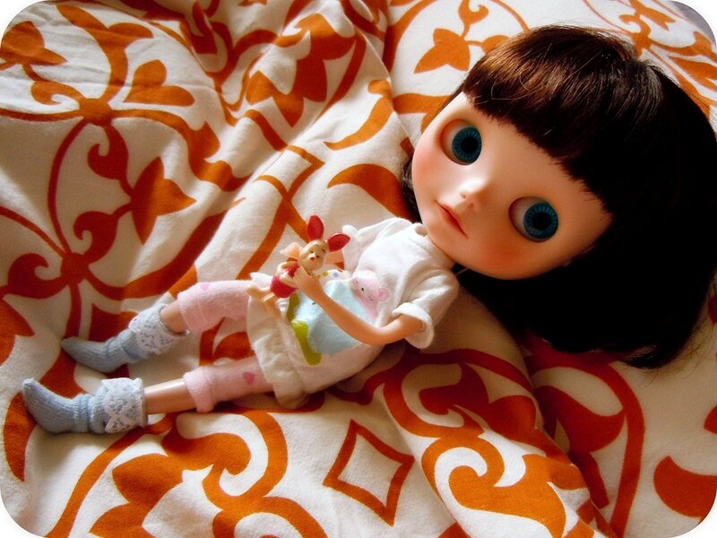 Doll Lying on Blanket — Orange