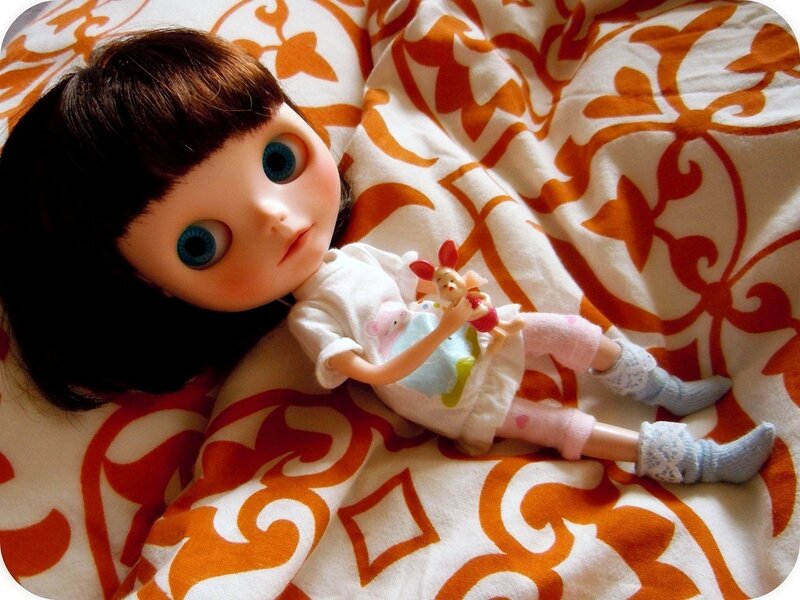 Doll Lying on Blanket