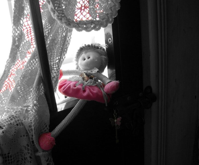 doll on a door handle