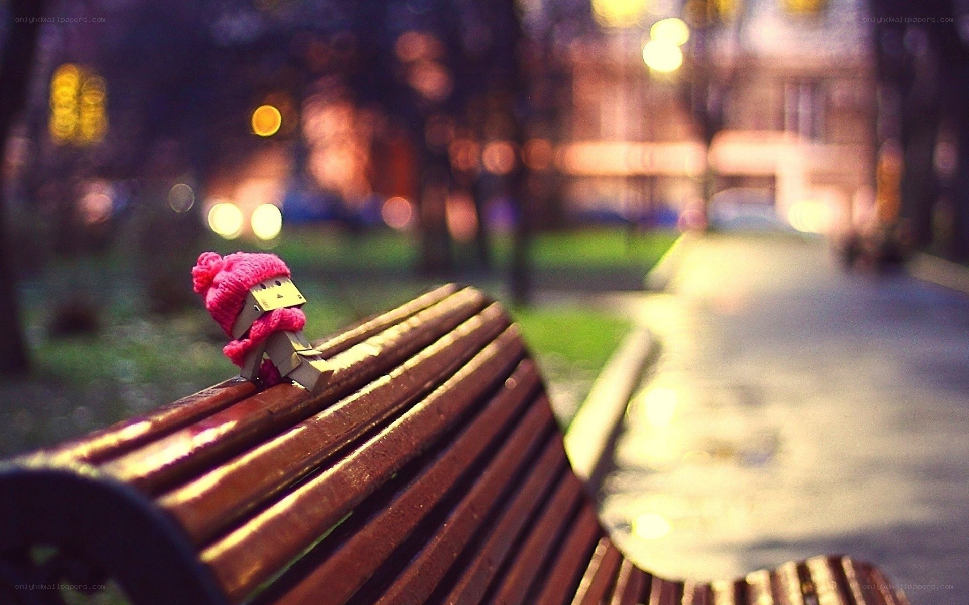 doll on a park bench