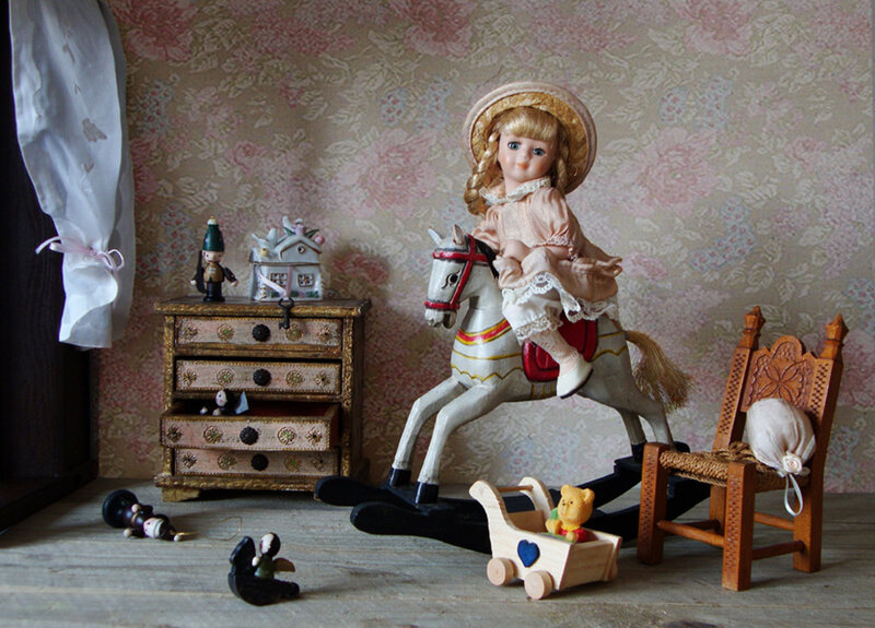 Doll on Rocking Horse