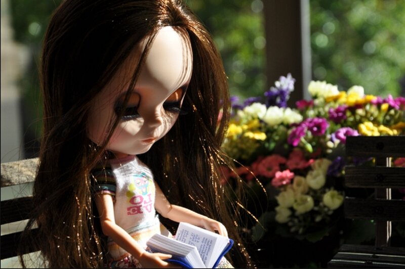 Doll Reading a Book