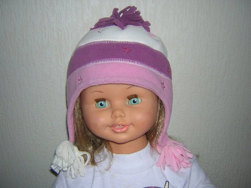 doll wearing a winter hat