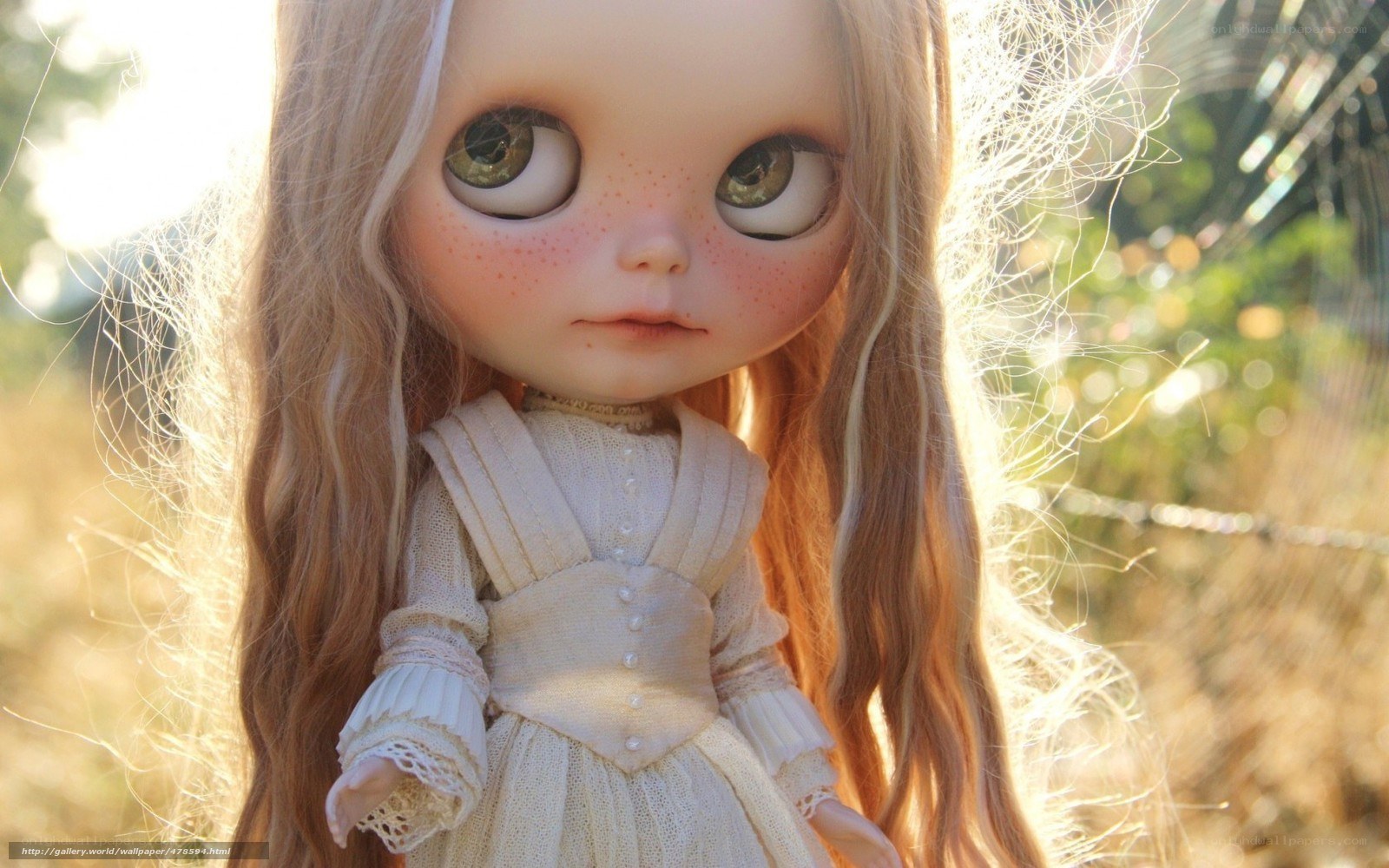 doll with big eyes in sunlight