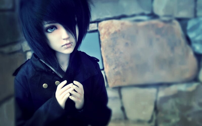 doll with black hair and coat