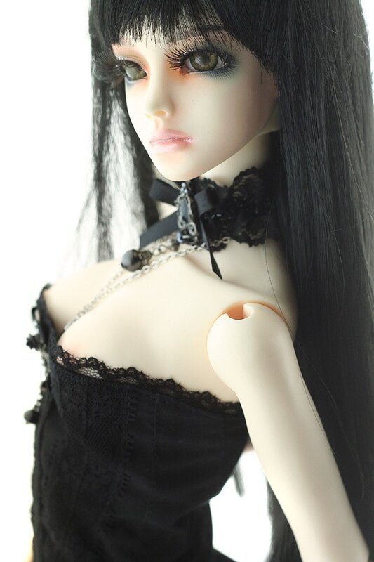 doll with black lace dress