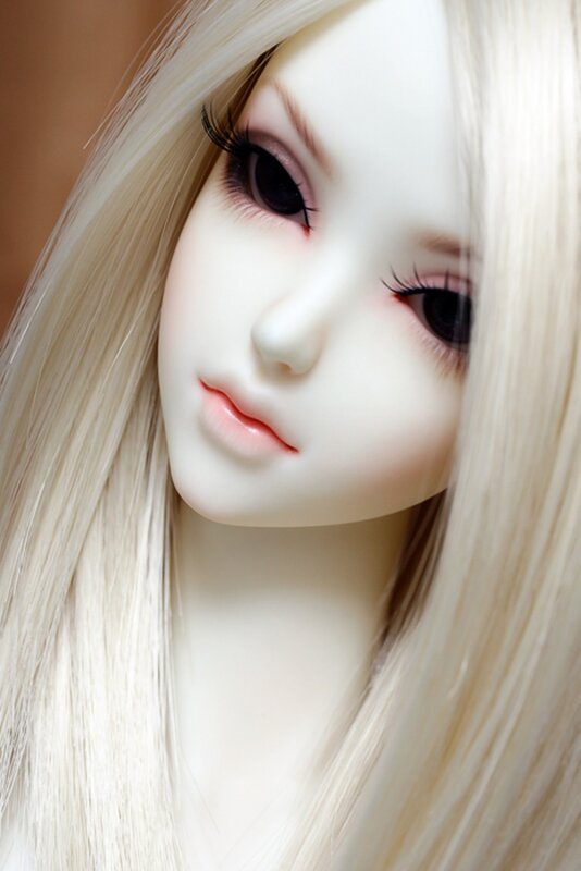 Doll with Blonde Hair — White, Calm, Photograph