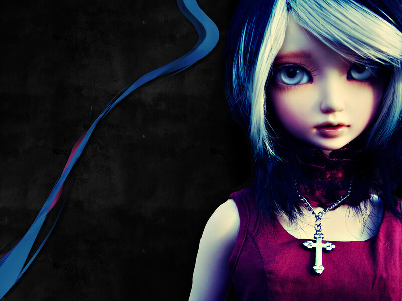 doll with blue hair and cross