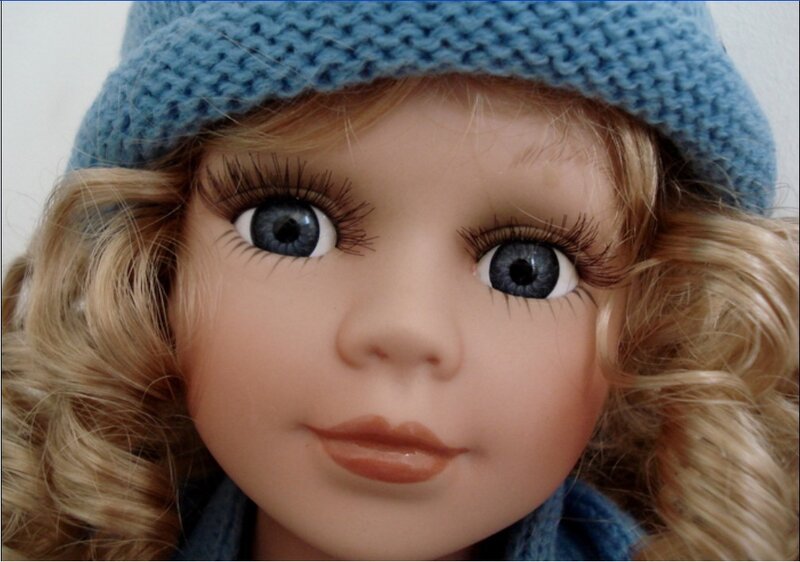 doll with blue hat