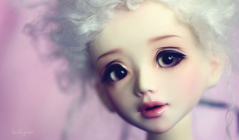doll with curly white hair