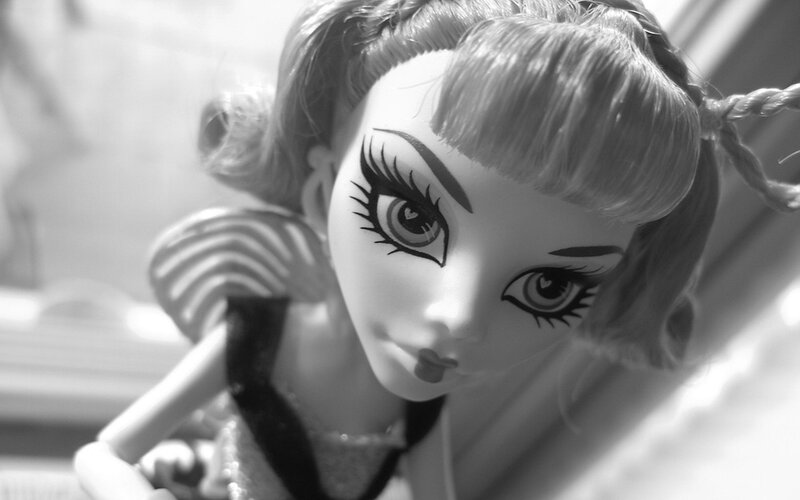 doll with dramatic makeup