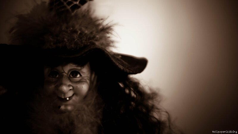 doll with feathered hat