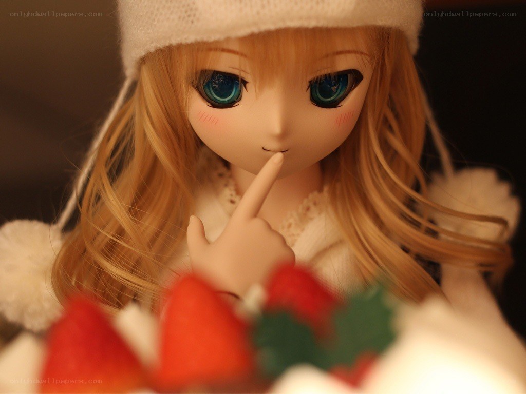 doll with finger to lips