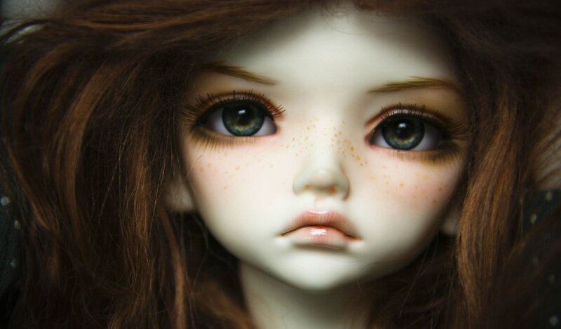 doll with freckles and green eyes