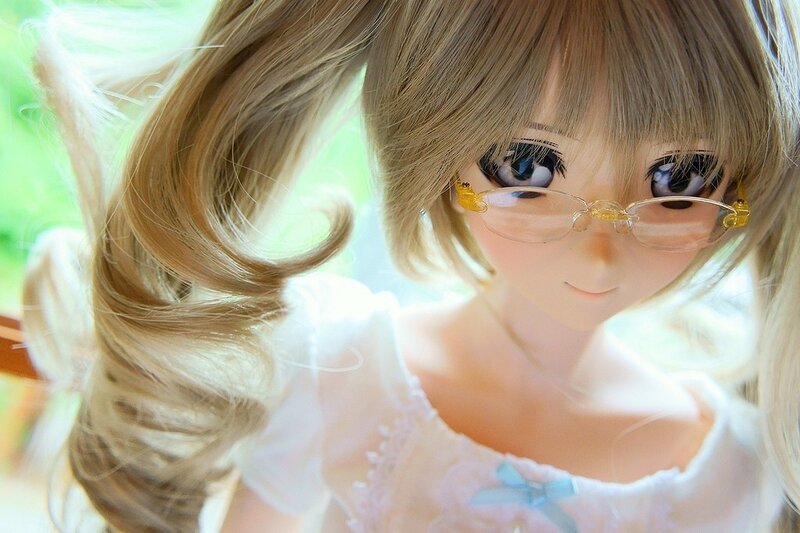 doll with glasses and blonde hair