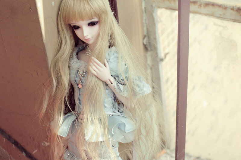 Doll with Long Blonde Hair — Melancholic