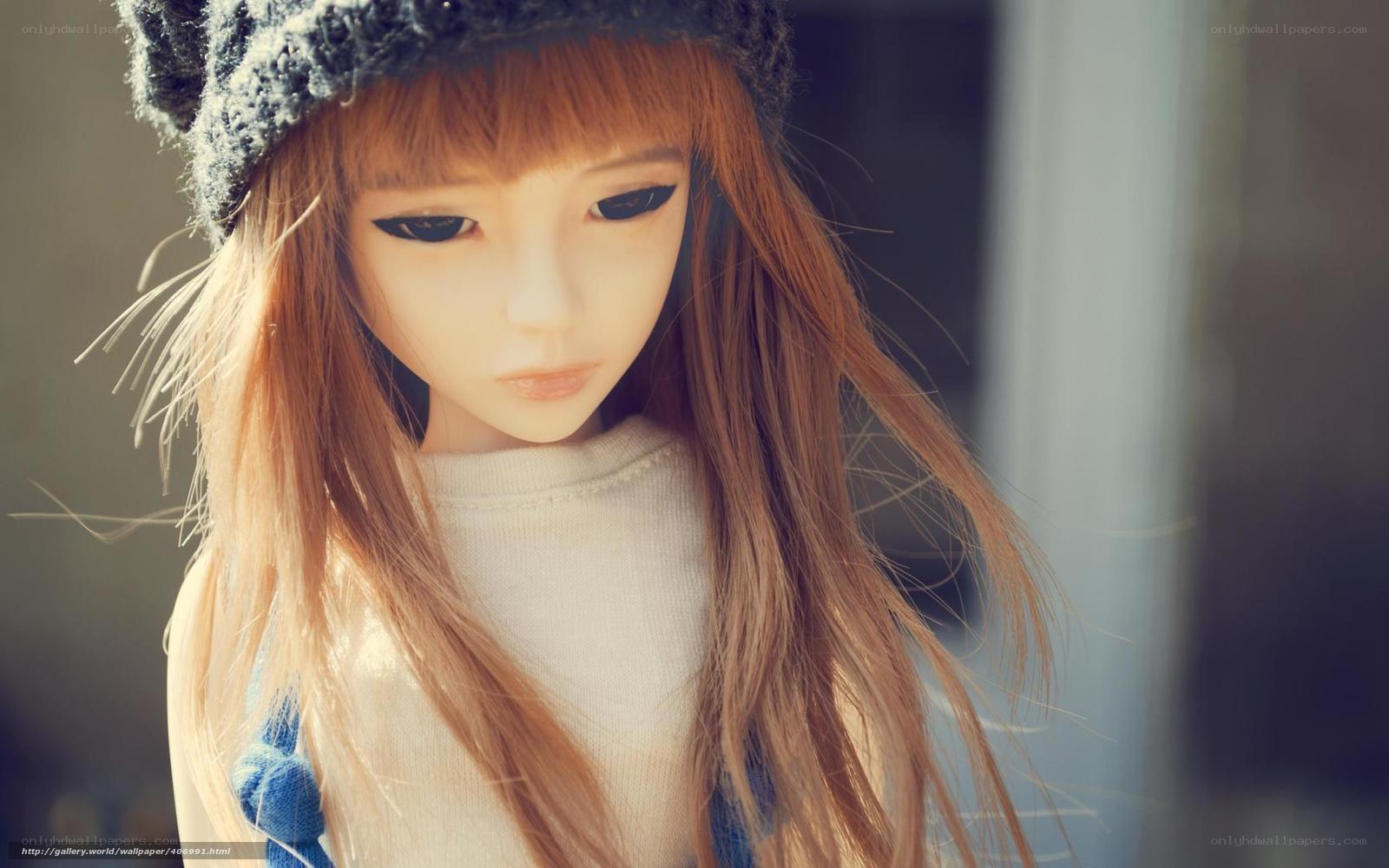 doll with long hair and hat