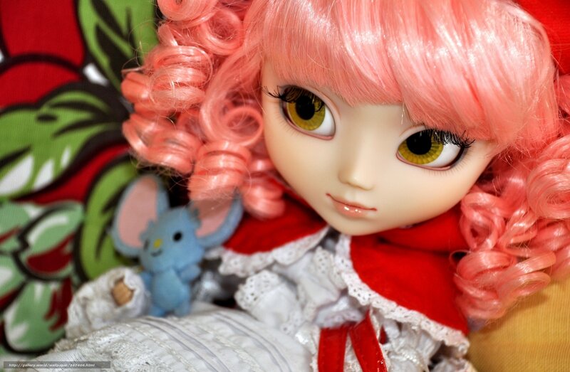 doll with pink hair and red cloak
