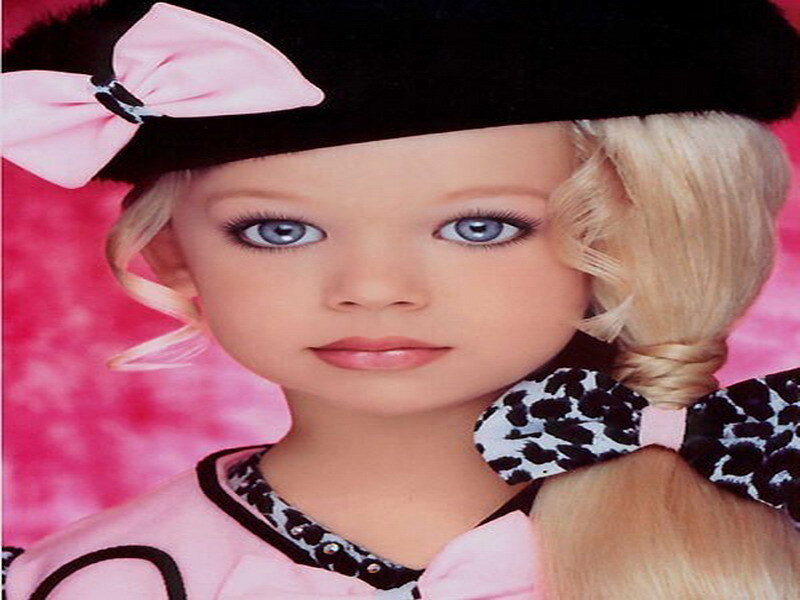 doll with pink hat and blue eyes