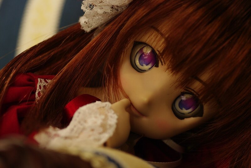 doll with purple eyes