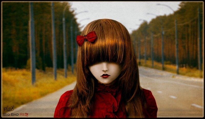 Doll with Red Bow
