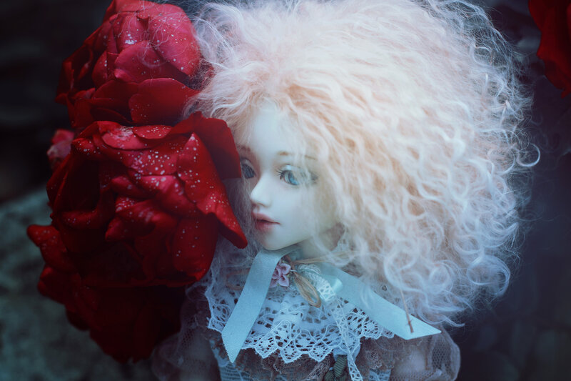 Doll with Red Flowers