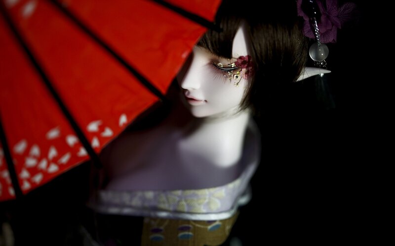 Doll with Red Umbrella