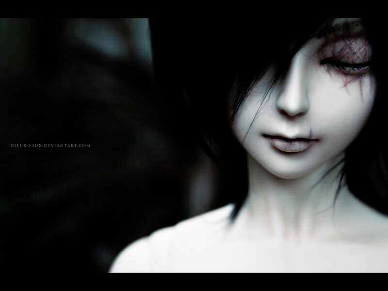 doll with scarred face
