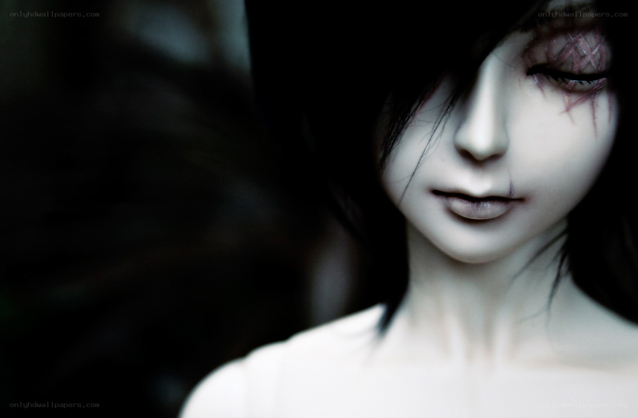 doll with scarred face