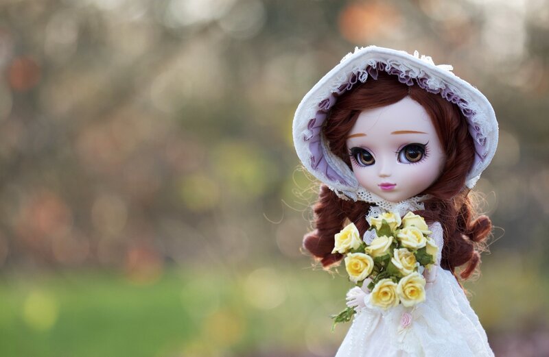 Doll with Yellow Roses