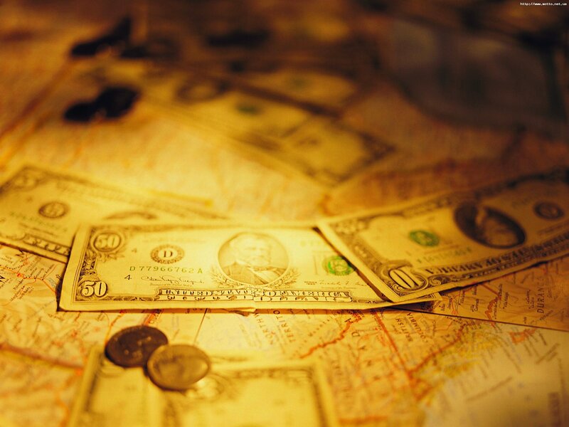 Dollar bills on a map