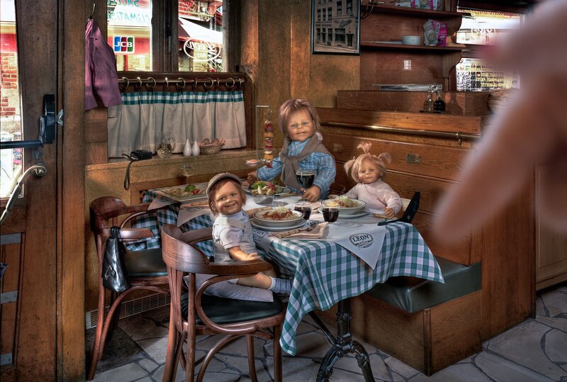Dolls dining in a restaurant