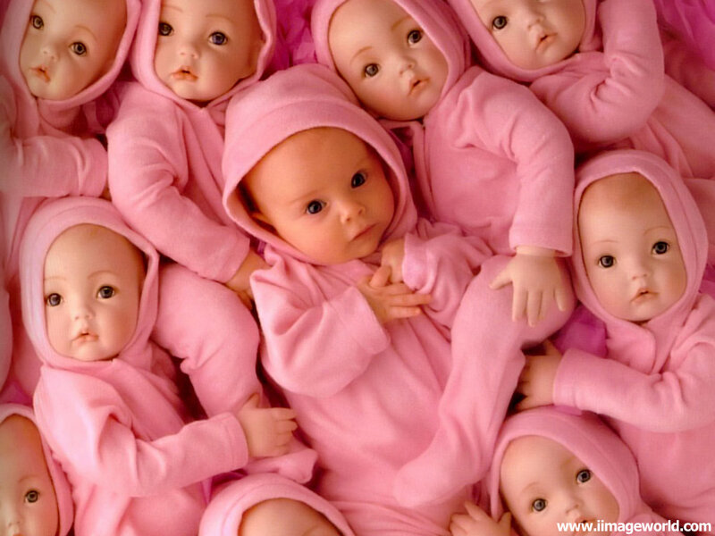 dolls in pink hooded outfits