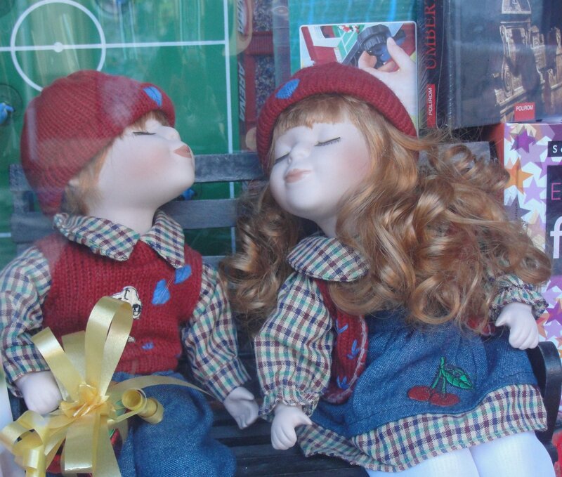 Dolls on a Bench