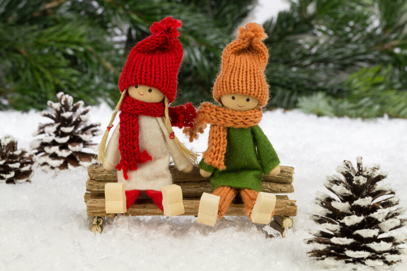 Dolls on Sled in Snow