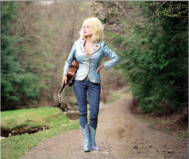 Dolly Parton on a forest path