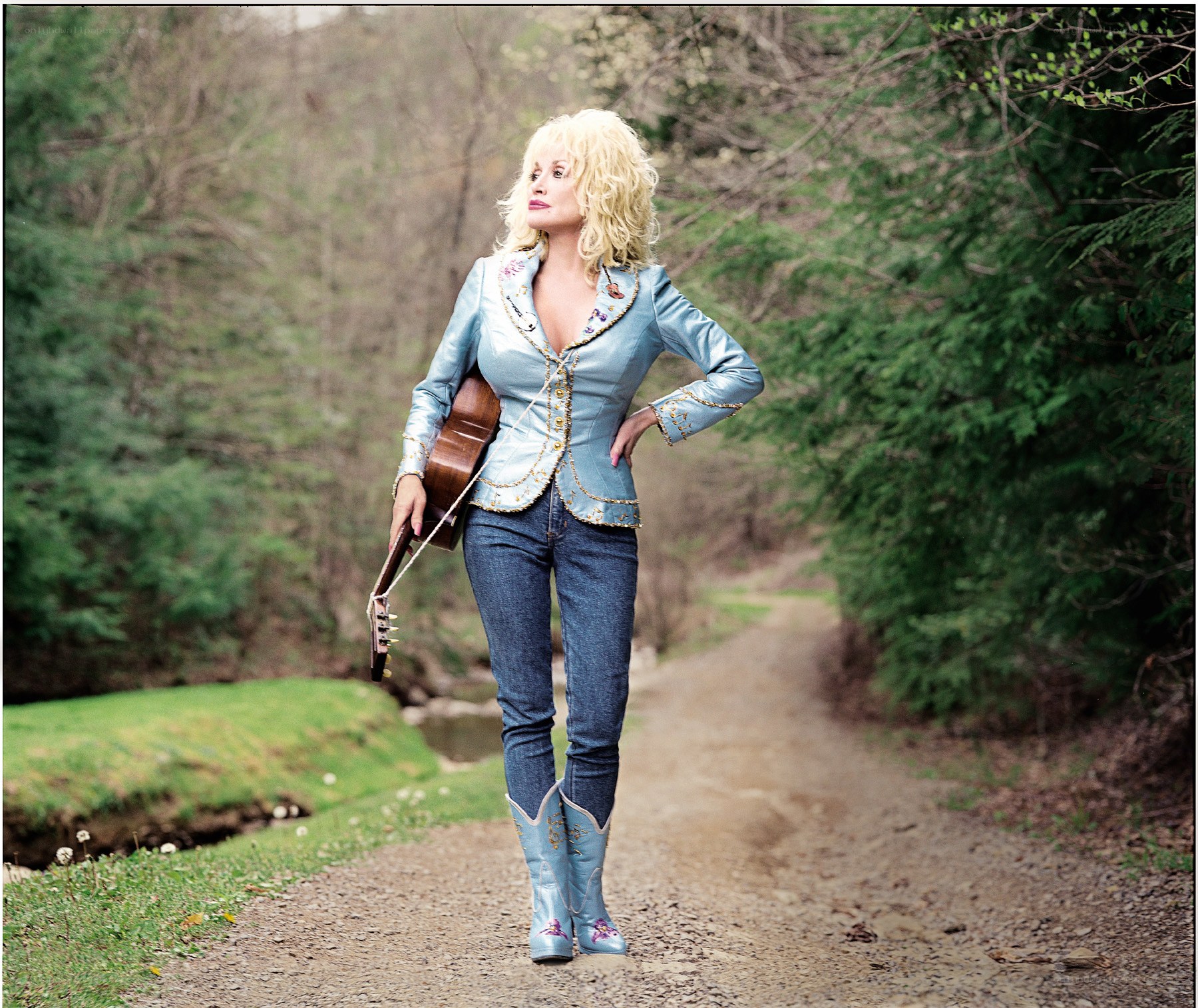 Dolly Parton on a forest path