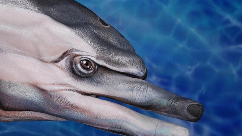 Dolphin Painted on Hand — Blue