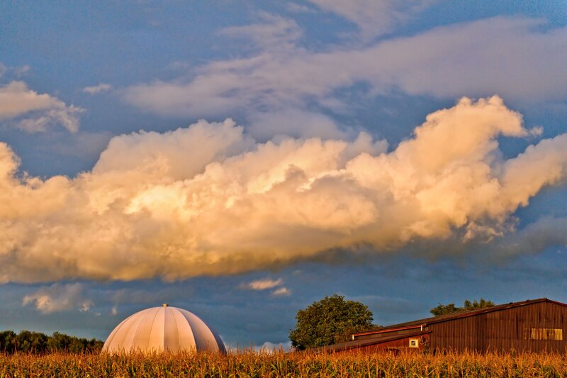 Dome in a cornfield at sunset
