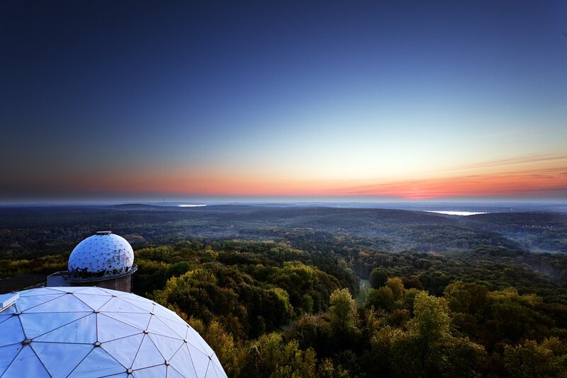 Domes over forest at sunset