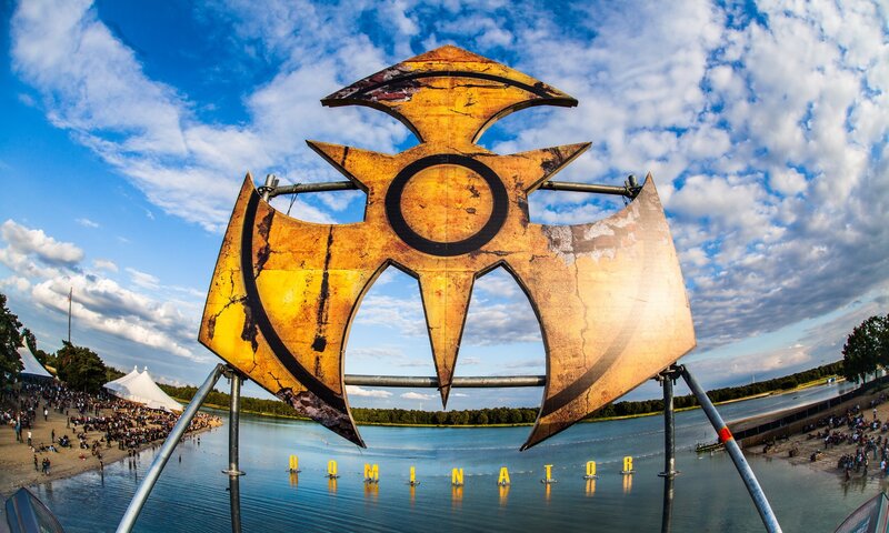 Dominator festival sign at lake