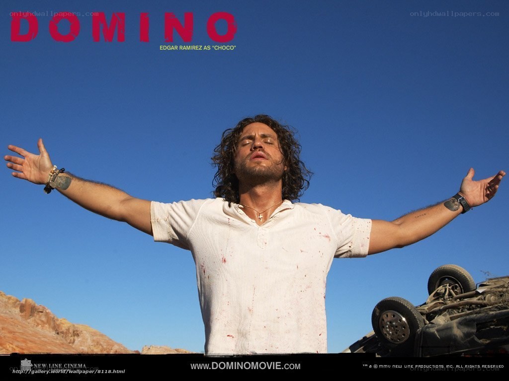 Dominic Choco stands with arms outstretched