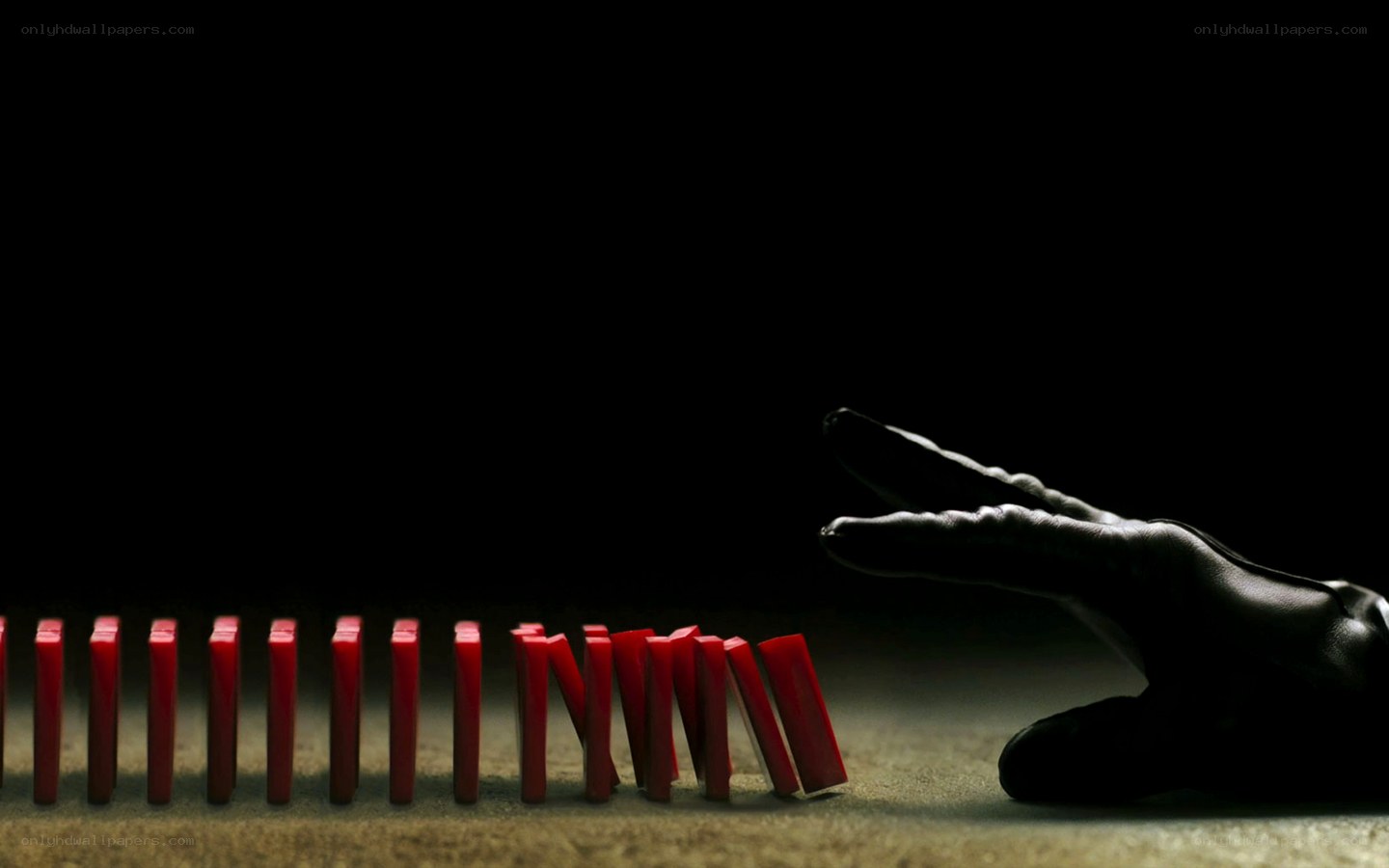domino effect with hand