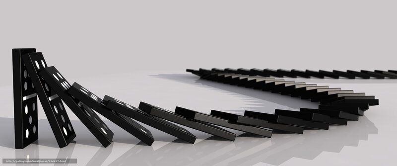 dominoes falling in chain reaction