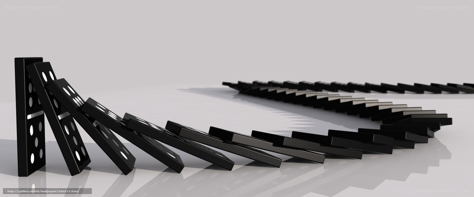 dominoes falling in chain reaction