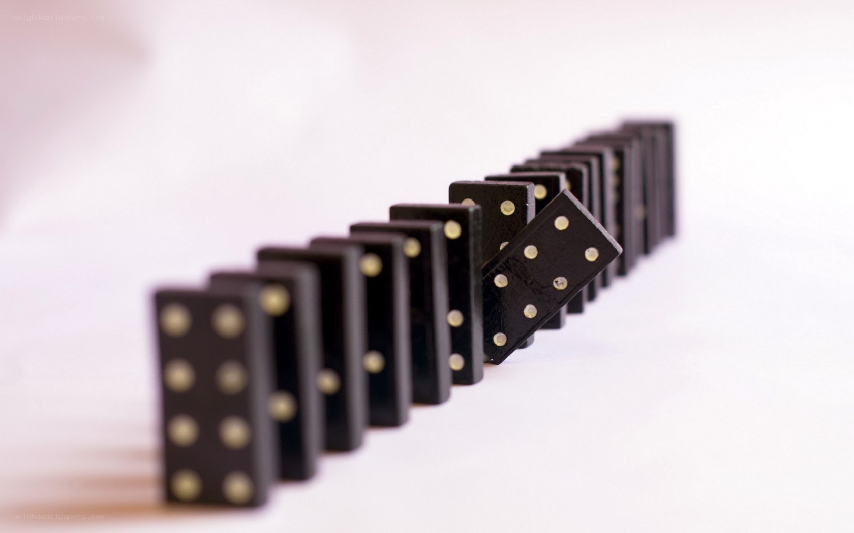 dominoes in a line