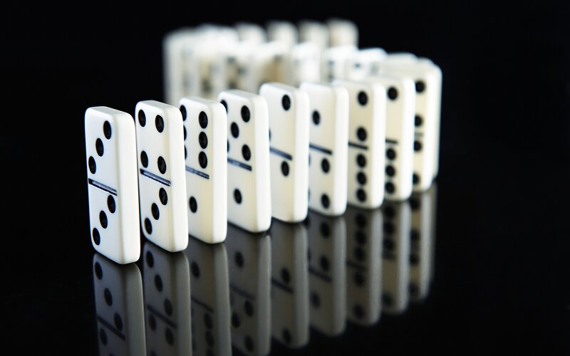dominoes in a line