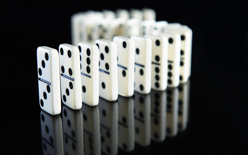 Dominoes in a Line — White, Dramatic