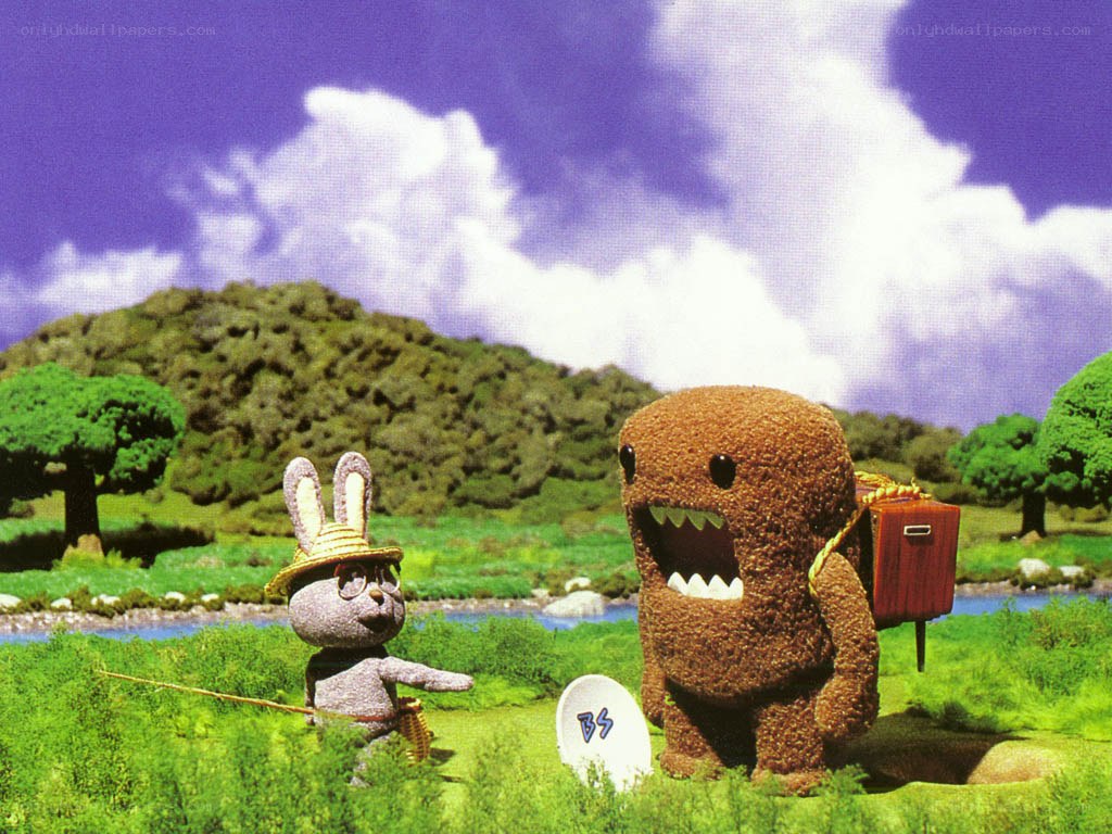 Domo and a rabbit in a field