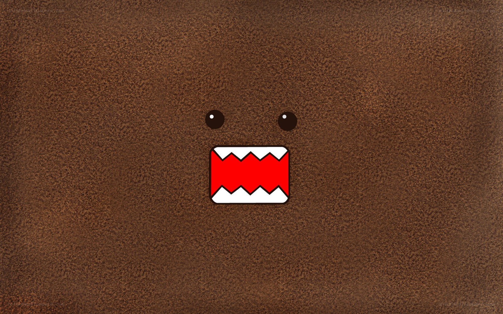 Domo character on brown background